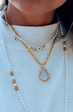 Pearl hamsa necklace